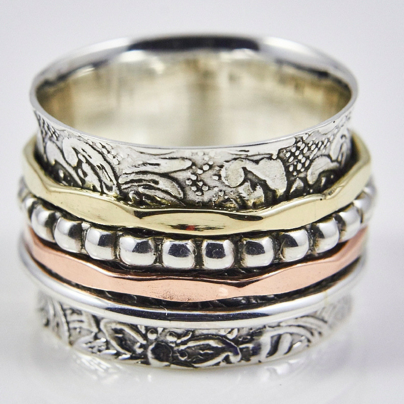 Four Band Spinner Ring